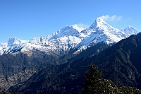 The mountains from the left is the Nilgiri (7061 m), Annapurna 1 (8091 m), Annapurna South (7219 m) and Hiunchuli (6441 m).