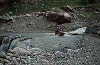Danne crossing a river in the Suru valley