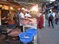 Meat sales in the side street of Colaba Causeway in Mumbai 2013