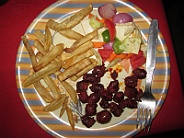 Goa sausages with salad and french fries at La Ben resaurang in Colva