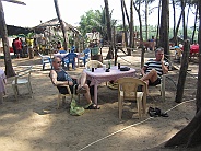Peter and Tommy waiting for their lunch at the Turtle beach at Galgibaga