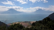 Lake Atitlan with volcanoes in the background.