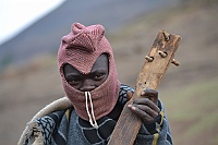 Man of the Basotho people (Blanket people). with stringed instruments.