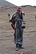 Man of the Basotho people (Blanket people). with stringed instruments.