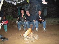 I, Bernt and Janne warm ourselves by the fire with a beer.