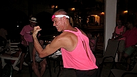 Thomas shows the muscles on bus party with the theme "Pink" at the hotel in Tamarindo.